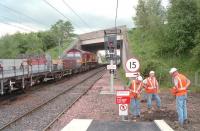 Putting the finishing touches to the platform at Newcraighall, shortly before its official opening in June 2002.<br><br>[Ewan Crawford /05/2002]