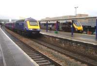 The delayed 09.31 FGW departure to Paddington, ex Swansea, with a dead 43134 at the head and driver on the phone, in platform 3 at Bristol Parkway on 4 June. The problem resulted in the 09.39 CrossCountry service to Edinburgh, ex Plymouth, being diverted into regional platform 4. The Paddington service continued forward a few minutes later making a slow exit with only one power car working.   <br><br>[David Pesterfield 04/06/2014]