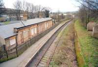 The partially restored station at Stanhope on the Wearhead branch during its <I>mothballed</I> period in early 2001, after closure of the Eastgate cement works but before the opening of the Wear Valley Railway. View is south east from the station footbridge back towards Wear Valley Junction. [See image 21987]<br><br>[Ewan Crawford //2001]