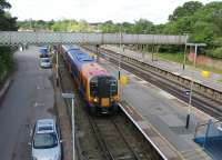 Weekend workings on the Lymington Branch use an EMU that is not available on weekdays. 450032 runs in to the branch platform at Brockenhurst, as seen from a temporary footbridge. A single DMU or EMU can maintain a 30 minute frequency service on the 5.5 mile Lymington branch. <br><br>[Mark Bartlett 25/05/2014]