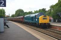 Class 40 no.345 coming to a halt for an extended stop at Darwen on 6 June while it waited for a late running service to clear the single line section from Bromley Cross. [See image 47567]<br><br>[John McIntyre 06/06/2014]