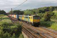 Two venerable Freightliner electric locos head south at Woodacre with a Coatbridge to Crewe intermodal service on the evening of 5 June 2014. 86622 (now in the new livery) emerged from Vulcan Foundry as E3174 in September 1965 while 86609 left Doncaster the same month as E3102 so they have ninety eight years service between them (and counting).<br><br>[Mark Bartlett 05/06/2014]