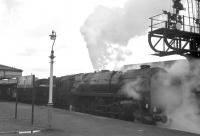 Britannia Pacific no 70032 <I>Tennyson</I> stands at Carstairs station on 26 March 1967 with <I>'Scottish Rambler No 6'</I>, shortly after arrival from Glasgow Central on its way to Carlisle.<br><br>[Bruce McCartney 26/03/1967]