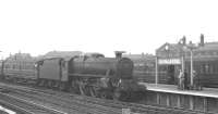 Black 5 no 44851 with the 8.33am Nottingham Midland - Scarborough at Doncaster in the summer of 1963.<br><br>[K A Gray 06/07/1963]