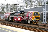 A Jarvis/Fastline tamper held in the station loop at Carstairs on the morning of 1 March 2006.<br><br>[John Furnevel 01/03/2006]