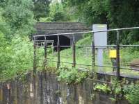 Grab shot from a passing train showing the south portal of Gaer Tunnel, on the freight only line from Gaer Junction [see image 47614].<br><br>[David Pesterfield 04/06/2014]