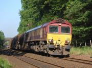 DBS 66084 climbs away from Dalgety Bay with the Mossend - Aberdeen Waterloo clay tanks, diverted through Fife because of engineering work in the Larbert area on 31 May.<br><br>[Bill Roberton 31/05/2014]