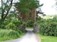 Bridge remains on the Peebles Railway just over half a mile south of Cardrona on the way to Innerleithen in June 2014. The Peebles Loop closed in 1962 and this section is now a popular walkway which at this point runs through the local golf course.<br><br>[John Furnevel 18/06/2014]