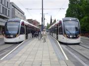 Trams crossing at the The Mound tram stop on 23 June. <br><br>[Bill Roberton 23/06/2014]