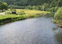 Looking south along the Tweed from the recently constructed (2013) footbridge near Cardrona [see image 47741]. Remains of the rail bridge that once carried the line from Peebles to Galashiels are visible just below the surface of the river as well as on the left (east) bank. <br><br>[John Furnevel 18/06/2014]