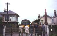 The last train at Coalburn on 2 October 1965 [see image 47737]. By this time the line had been cut back from Bankend and the level crossing gates removed.<br><br>[John Robin 02/10/1965]