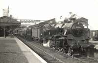 A mixed train preparing to leave Fraserburgh for Aberdeen in April 1955. Locomotive in charge is BR Standard 2-6-4 tank no 80004, delivered new to Kittybrewster shed two and a half years earlier.<br><br>[G H Robin collection by courtesy of the Mitchell Library, Glasgow 11/04/1955]