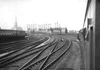 View from the 2.15pm Liverpool - Glasgow leaving Preston on 10 August 1960. The locomotive at the head of the train is Black 5 no 44677. The spire of St Walburge's Church dominates the background.<br><br>[David Stewart 10/08/1960]