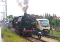 On 14th June at Bergen auf Ruegen, the train driver undertakes a complex technical manoeuvre before the departure of the 09.40 Pressnitztalbahn train to Putbus and Lauterbach Mole. This Plandampf service is headed by a Class 52 2-10-0 instead of the normal diesel railcar on the right. The passenger service on this branch is financially supported by the Mecklenburg-Vorpommern Land (state) on a franchise basis, with Deutsche Bahn having lost the operation to private operators in 2003.<br><br>[David Spaven 14/06/2014]