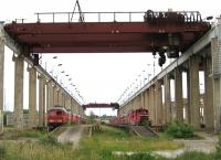 A graveyard for scores of Deutsche Bahn diesels - mostly Class 232 and 233 - at the massive (and partially abandoned) Mukran works and marshalling yard on Ruegen on 19th June [with thanks to Bill Jamieson].<br><br>[David Spaven 19/06/2014]