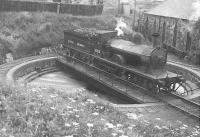 Ex-GNSR 4-4-0 no 62230 on the turntable at Fraserburgh on 12 July 1950.<br><br>[G H Robin collection by courtesy of the Mitchell Library, Glasgow 12/07/1950]