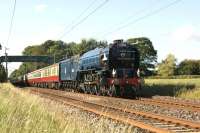 The return working of <I>The Border Raider</I> on 5 July 2014 saw A1 no. 60163 <I>Tornado</I> hauling the tour from Carlisle to Preston where it handed over to a DBS Class 90 for the return to London. The special is seen here at speed near Brock.<br><br>[John McIntyre 05/07/2014]