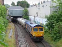 GBRf 66736 passes the surviving Edinburgh suburban Inner Circle platform at Morningside Road on 8 July with the 6S45 North Blyth - Fort William alumina train.<br><br>[Bill Roberton 08/07/2014]