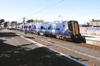 380018 ready for the off at Largs on 1 July with the 17.33 service to Glasgow Central.<br><br>[John Gray 01/07/2014]