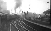 Noisy departure from St Enoch on Friday 26 August 1960, as Hulford 2P 40686 joins forces with Holbeck Royal Scot 46113 <I>Cameronian</I> to take out the <I>Thames-Clyde Express</I>. <br><br>[David Stewart 26/08/1960]