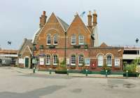 The very tidy exterior of Lymington Town station building seen from the forecourt. This staffed station is operated by South West Trains and enjoys a 30 minute frequency service seven days a week.<br><br>[Mark Bartlett 20/05/2014]