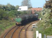 The daily tankers from Grangemouth arriving At the Dalston Ineos Depot in Cumbria on 14 May 2014. The depot is accessed via the siding on the left. [See image 42740]<br><br>[Brian Smith 14/05/2014]