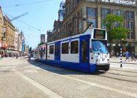 Amsterdam BN 12G tram No. 841 passing through Dam Square on 10 July 2014.<br><br>[Colin Miller 10/07/2014]