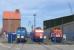 Pressnitztalbahn and Arcelor locos (left and middle respectively) on aggregates trains beside a shunting loco on the Stralsund harbour branch in Mecklenburg-Vorpommern (north east Germany) on 17th June. Note the electric loco on a non-electrified branch.<br><br>[David Spaven 17/06/2014]
