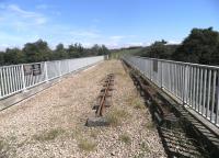 Looking across the historic Laigh Milton Viaduct, spanning the River Irvine 5 miles west of Kilmarnock, in July 2014. Built by the Kilmarnock and Troon Railway in 1812 it closed in 1846 when the railway was realigned. Thought to be the oldest surviving viaduct on a public railway, the restored structure has been category A listed since 1982. [See image 7023]<br><br>[John Yellowlees 17/07/2014]