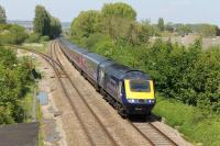 FGW 43020 speeds past Uphill Junction leading a Sunday Paddington to Plymouth HST service on 18th May 2014. The Weston-super-Mare loop line can be seen trailing in on the left. <br><br>[Mark Bartlett 18/05/2014]