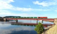 66114 in DB Schenker red livery hauls the tanker train from Lairg  across the Ness Viaduct on 18 July 2014. The train is destined for Mossend yard.<br><br>[John Gray 18/07/2014]