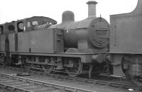 LMS <I>Jinty</I> 0-6-0T 47593 stands amongst the weekend guests on Workington shed on Saturday 22 September 1962. A long term resident of 12D, the locomotive was officially withdrawn by BR that same month.<br><br>[K A Gray 22/09/1962]