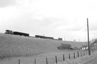 A Waverley tracklifting train at Sandholm, north of Newcastleton, in early 1970, heading for Hawick.<br><br>[Bruce McCartney //1970]