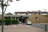 The new tramway bridge over Balgreen Road in July 2014, with Balgreen tram stop just off picture to the right. Note the much lower E&G Railway bridge immediately beyond, together with height boards and 14 ft clearance warnings. [See image 40474]<br><br>[John Furnevel 19/07/2014]