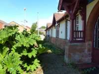 The approach side of West Kilbride station in July 2014. Usually hidden by a fence (over which this was taken) showing the west elevation. Sadly, Chu Chu's restaurant was the last occupant and the building is unused. [See image 40294]<br><br>[Colin Miller 22/07/2014]