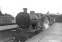 40686 waits in one of the bays at Dumfries with a Glasgow train on 26 August 1960. The 4-4-0 had earlier worked south as pilot to Royal Scot 46113 on the <I>Thames-Clyde Express</I> from St Enoch. [See image 47951]<br><br>[David Stewart 26/08/1960]