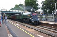 Passengers waiting for a Liverpool service and a few spectators who had come out specially to see the <I>Cumbrian Mountain Express</I> watch as it hurries south through Leyland on the return from Carlisle to Crewe during the evening of 26 July 2014 behind A4 Pacific no 60009 <I>Union of South Africa</I>.<br><br>[John McIntyre 26/07/2014]