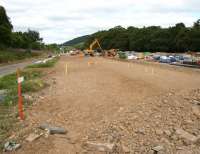 Work in progress on the station site at Tweedbank on 29 July 2014. View towards Galashiels, with the currently closed pathway on the left following the original Waverley route.<br><br>[John Furnevel 29/07/2014]
