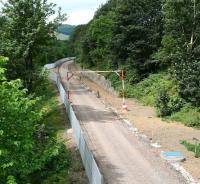 View north west over the former Selkirk Junction towards Galashiels town centre on 29 July 2014 from the pedestrian footbridge linking Galafoot Lane and Woodstock Avenue. [See image 50304]<br><br>[John Furnevel 29/07/2014]