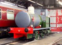 Inside the shed at the Ayrshire Railway Preservation Group 40th Anniversary Open Day on 3 August. Seen here is the Ardrossan Shell Refinery Fireless locomotive No. 8 (Barclay 1952/1928) undergoing restoration. This was the last steam locomotive working commercially in Scotland. The Refinery closed in 1986. [See image 38050]<br><br>[Colin Miller 03/08/2014]