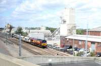 A train loading at the Hanson Stockley Park facility near West Drayton on 20 July 2005. View north west from the window of a Paddington bound Heathrow Express on the flyover spanning the GW main line at Stockley Junction.<br><br>[John Furnevel 20/07/2005]