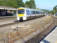 168107 speeds through High Wycombe on 29 July with an express for Banbury.  In the foreground is the former Marlow branch siding with its new platform for terminating services from Marylebone. <br><br>[Bill Roberton 29/07/2014]