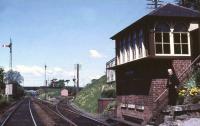 Signalman Willie McCurdie poses for the camera on the steps of Clarkston signal box in 1961.<br><br>[John Robin //1961]