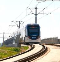 A city bound tram on the flyover at Saughton on 25 July.<br><br>[John Furnevel 25/07/2014]