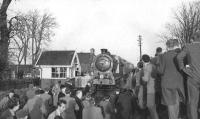 Looking back over the crossing towards Rosslynlee station on 3 February 1962 showing J37 0-6-0 no 64587 with the <I>Farewell to Peebles</I> railtour. The Peebles Loop was closed to passenger traffic south of Hawthornden Junction two days later.<br><br>[David Stewart 03/02/1962]