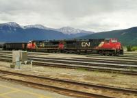 Canadian Nation Railway General Electric GE C44-9W Nos 2559 & 2517 will undoubtedly have needed all their combined 8,800 horsepower to haul this heavy mixed freight up from the plains of Alberta as they head through Jasper further into the Rockies and towards the west coast.<br><br>[Malcolm Chattwood 12/06/2014]