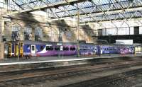 156490 prepares to depart from Carlisle platform 5 with the 17:28 service to Newcastle on 7th August 2014. Standing beyond at platform 6 is the 18:14 Leeds via Settle service.<br><br>[Colin McDonald 07/08/2014]