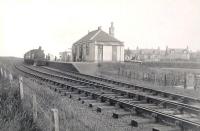 F4 2-4-2T no 67151 stands at St Combs station in July 1951 with the branch train from Fraserburgh.<br><br>[G H Robin collection by courtesy of the Mitchell Library, Glasgow /07/1951]