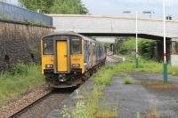 The May 2014 timetable brought changes in the North West generally and in particular at Ashton-under-Lyne. TransPennine services between the North East and Liverpool were rerouted to pass through and stopping services on the Standedge route now start from Blackpool North rather than Lime Street. 150273 pulls away from Ashton towards Stalybridge on 9 June with a Blackpool to Huddersfield <I>stopper</I>. <br><br>[Mark Bartlett 09/06/2014]