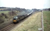 An EE Type 4 with a trainload of Hillman Imp cars from the Rootes plant at Linwood runs south through Kennishead on 3 April 1965. <br><br>[John Robin 03/04/1965]